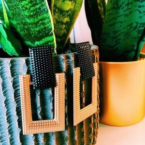 Gold and black hoop earrings